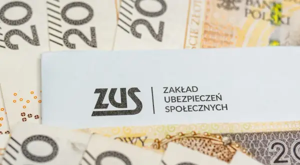 ZUS na tle banknotów 200 zł. Nowe zasady emerytury po mężu mogą być kluczowe dla wielu rodzin.